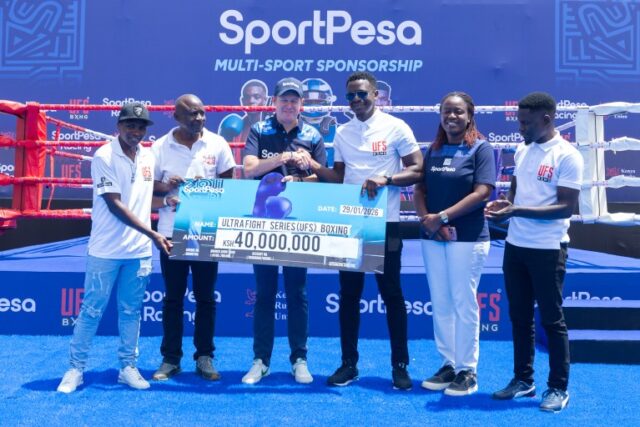 Ultra-Fight-Series-UFS-Promoter-Maurice-Odera-and-SportPesa-Chief-Commercial-Officer-Jason-Gibson-shake-hands-after-the-presentation-of-a-Ksh-40-million-cheque-to-UFS